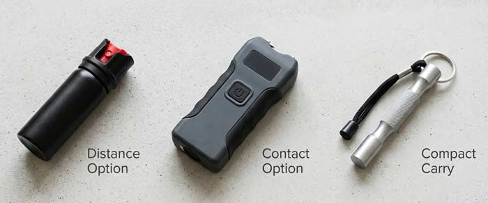 Comparison image showing pepper spray, compact stun device, and self defense keychain arranged as everyday carry safety tools