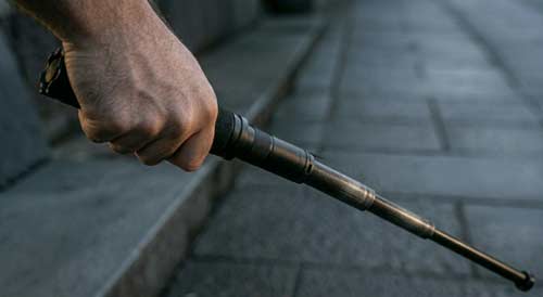 An expandable baton being opened up