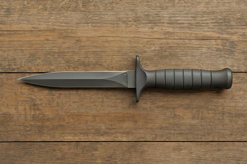 Gerber Mark II combat knife on a wooden surface
