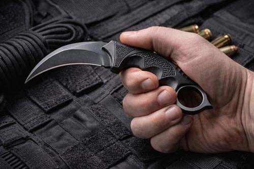 Karambit knife in a tactical grip